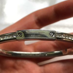Sterling silver micheal Kors bangle with clasp